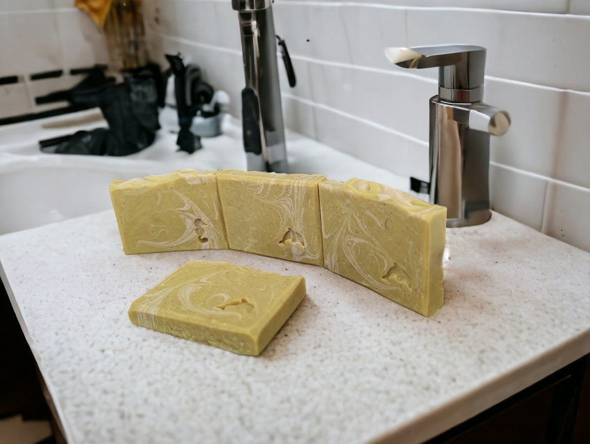Good for your skin, handcrafted soap bar. Banana Breeze Bar soap (aka Monkey Farts) featuring Goat Milk Soap, Colloidal oats, kaolin clay and banana fragrance to up your personal care game. Mustard colored base with white swirls. Available in 3 sizes Regular bar, small bar and Travel Guest Hotel sized soap bar. Available from Cheryl's Southern Soapery.