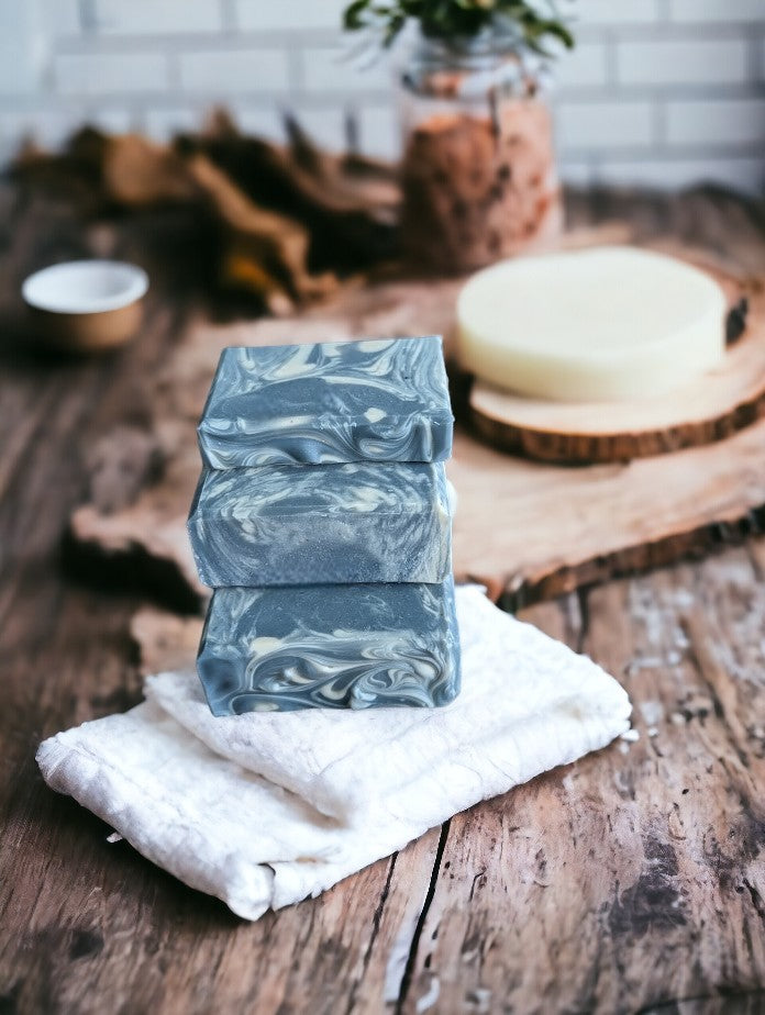 Main soap color is blue with creamy white swirls. Loaded with kaolin clay, colloidal oats and other good for your skin ingredients.  Up your health and beauty care game with Blueberry Burst Soap from Cheryl's Southern Soapery.  Available in 3 sizes:  Regular size, Small size and Travel/Guest size.  Regular  bar is 1"W x2.5"L x 4"H.  Small bar is 1"W x2.5"L x 2"H  Travel/Guest size is .5W x 2.5"L x 2"H