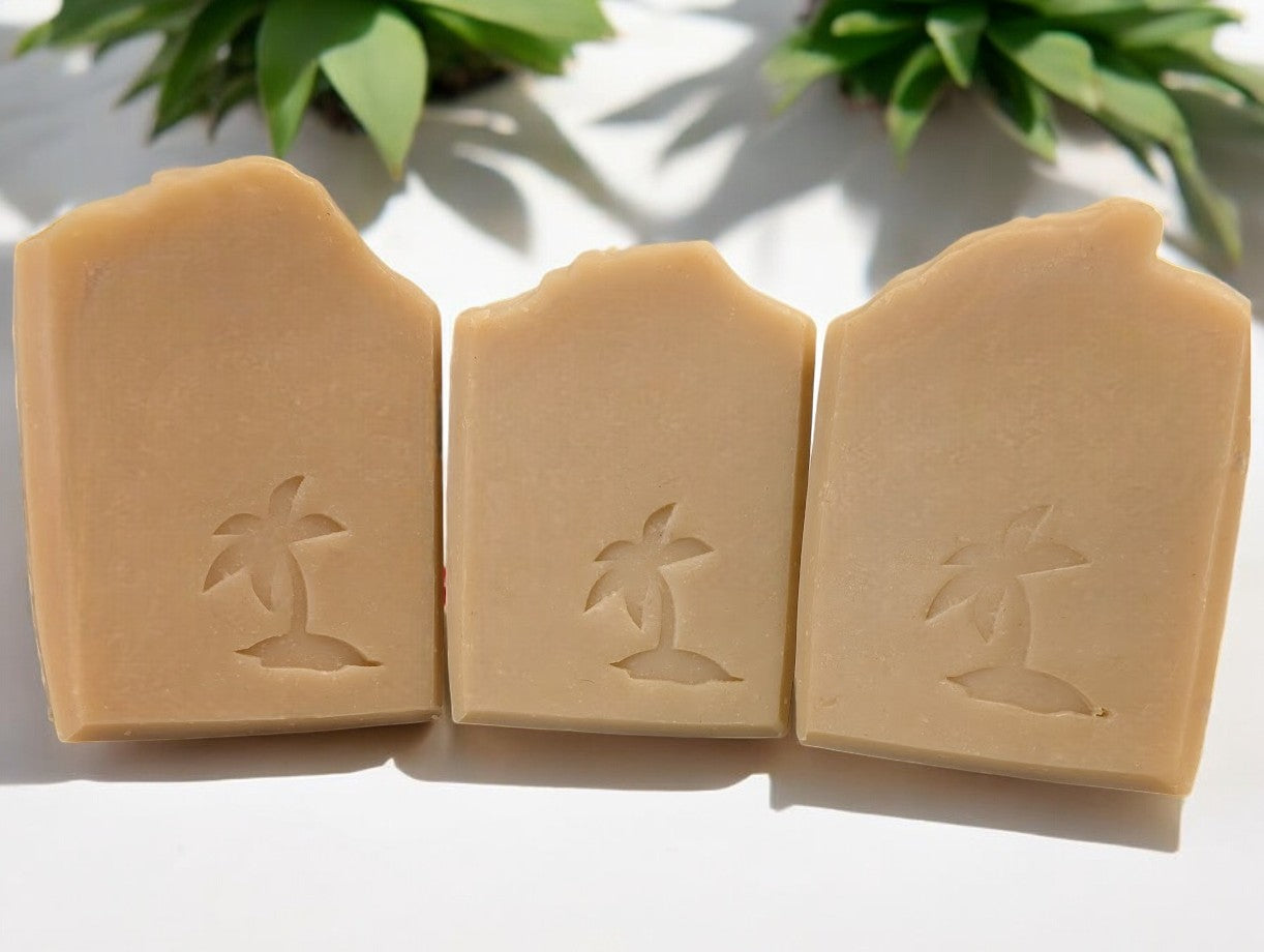 Handcrafted creamy tan soap with a palm tree stamped on the front of this harmonious, soap boasting the earthy fragrance of Sandwood Patchouli with Hemp Oil and Dead Sea Mud.  It's a perfect addition to your personal care products!