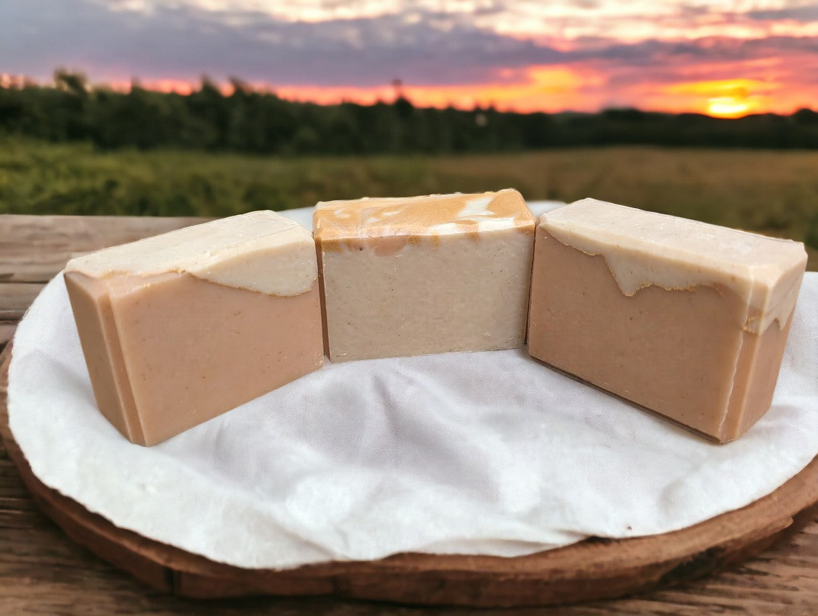 Cold process small sized soap featuring tangerine and tan block coloring separated by a gold mica line.  The scent is a refreshing blend of tangy citrus fruits (lemon, lime, grapefruit) paired with subtle notes of cucumber, pineapple, blackberry, and champagne. Think Burst of Energy* and you'll understand the scent. Also available in regular size, and travel / guest size.