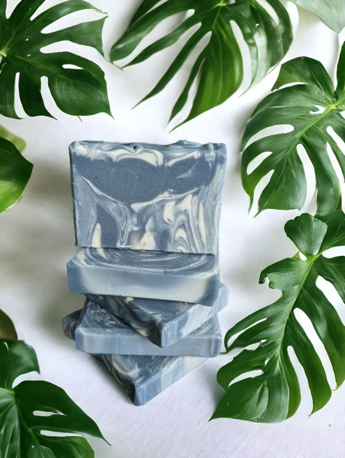 Main soap color is blue with creamy white swirls. Loaded with kaolin clay, colloidal oats and other good for your skin ingredients.  Up your shower game with Blueberry Burst Soap from Cheryl's Southern Soapery.  Available in 3 sizes.  Travel/Guest Bar pictured (.5"W x 2.5"L x 2"H)
