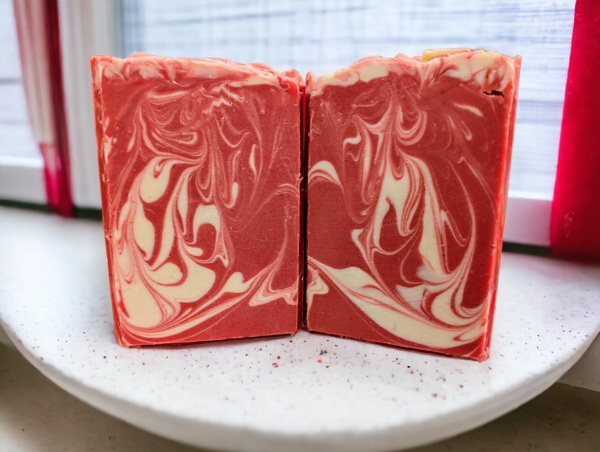 Handmade and cut cold processed soap. Strawberry Red colored soap with white swirls. Fresh Picked Strawberry fragrance oil. 3 sizes: Regular, Small and Travel Size for your bath and body product needs at home or on the road.