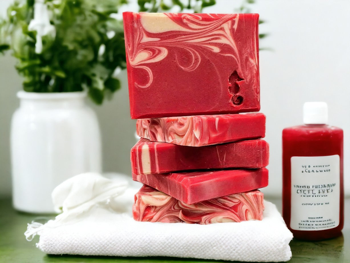 Cold processed soap bar with strawberry red main color with white swirls. Small and Travel bars stamped with sea creatures. Features Avocado Oil, Colloidal Oats and Kaolin Clay. Fresh Picked Strawberry fragrance oil.