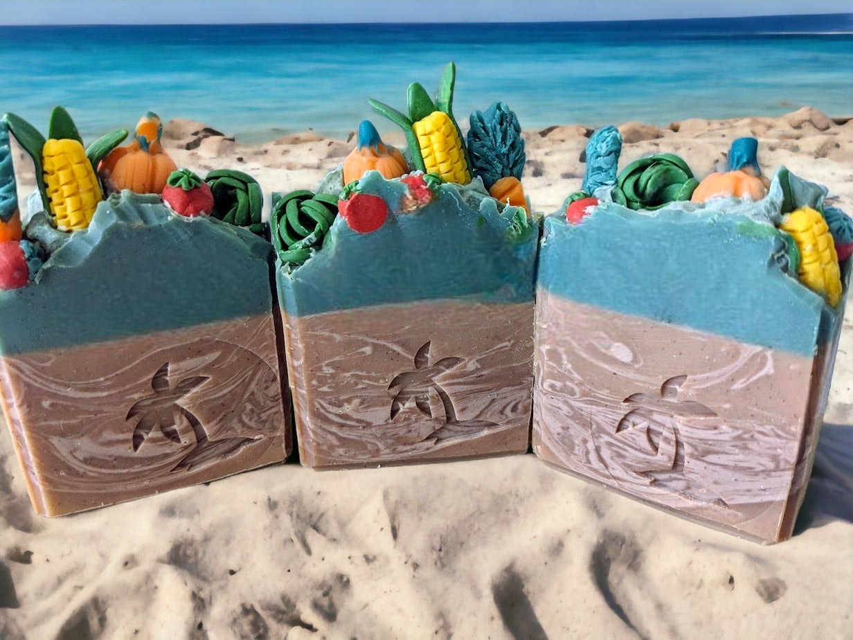 Let your garden shine! This luxurious, handcrafted decorative soap is covered in vegetable decorations: Carrots, tomatoes, corn, pumpkin and lettuce - so you can bring a little bit of nature and your garden into your daily routine. The top is green and the bottom is a lighter brown with swirls.