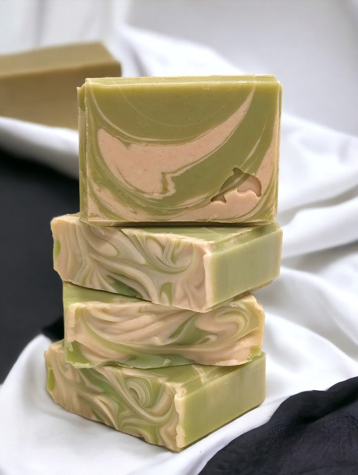 Lime green small sized bar soap with cream swirl accents. Scented with Key Lime Pie fragrance oil. Each stamp is stamped with dolphins, sea horses or clown fish. Soap features Hemp Oil, Shea Butter, Goat Milk, Kaolin clay and colloidal oats.