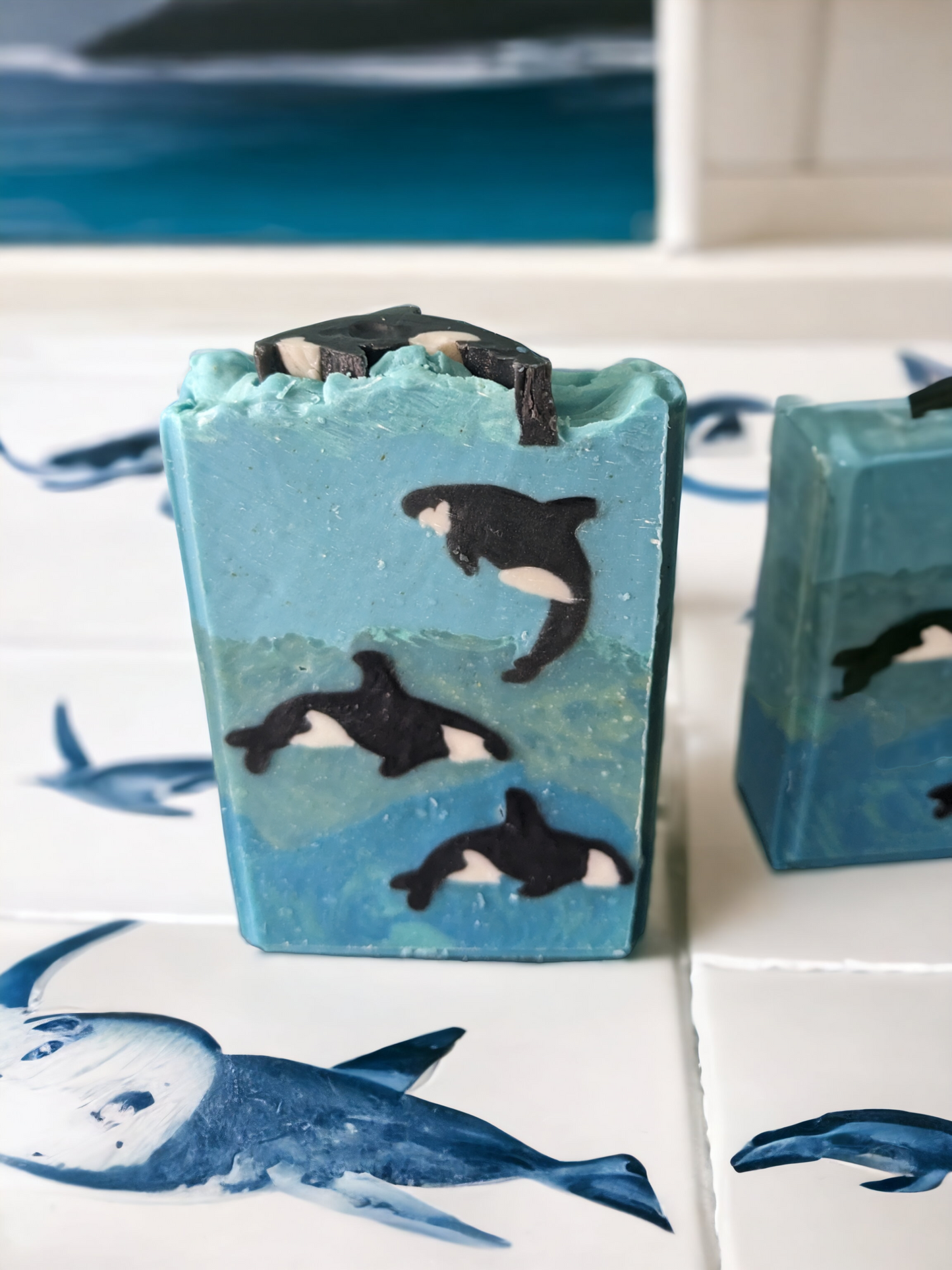 No whale of a tale here – just a luxurious bars soap with lots of lather and invigorating ocean freshness! This one is perfect for gift giving this holiday season. This decorative soap is scented with Abalone & Sea Fragrance oil and features an ocean scene with 3 Orcas - 2 swimming and 1 jumping.. Our Orca Odyssey, handcrafted Luxury Soap is all you need to emerge from the shower feeling as fresh as a sea breeze!