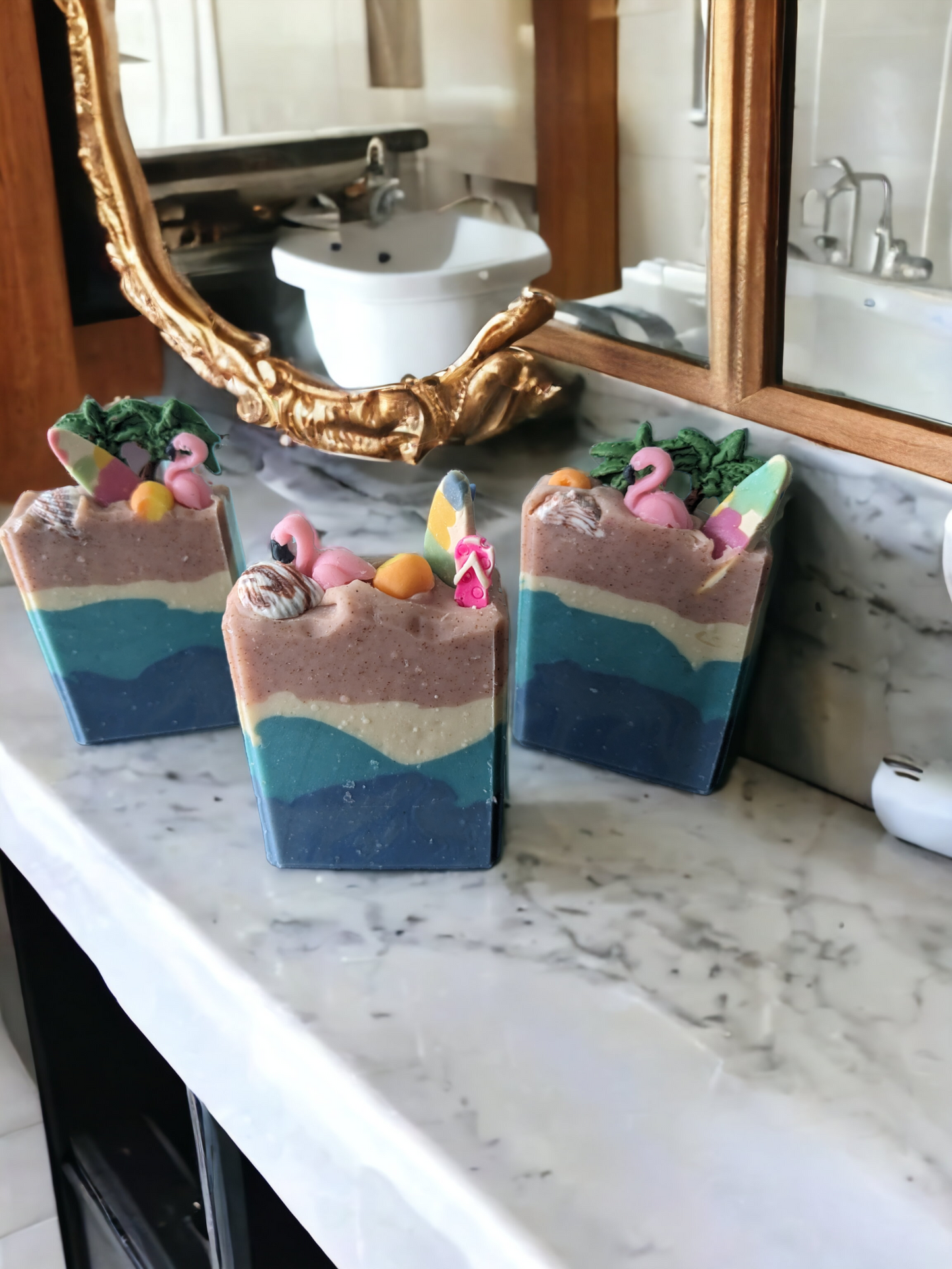 Luxurious beach themed butter soap bar with delightful beach decorations like Palm Trees, surf boards sea shells and beachballs.  Scented with Pink Sangria, this soap was inspired by Pink Sands Beach in the Bahamas.