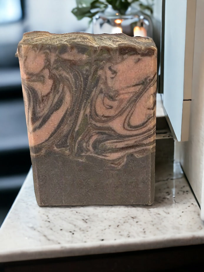 Bubbly soap bar with great lather! Features swirls of brown and green that'll have you dreaming of crisp air, a good read, a crackling fire, and your fave sweater! Embrace the cozy vibes of autumn and winter with this delightful bar!! Similar to BBW's Sweater Weather* scent.