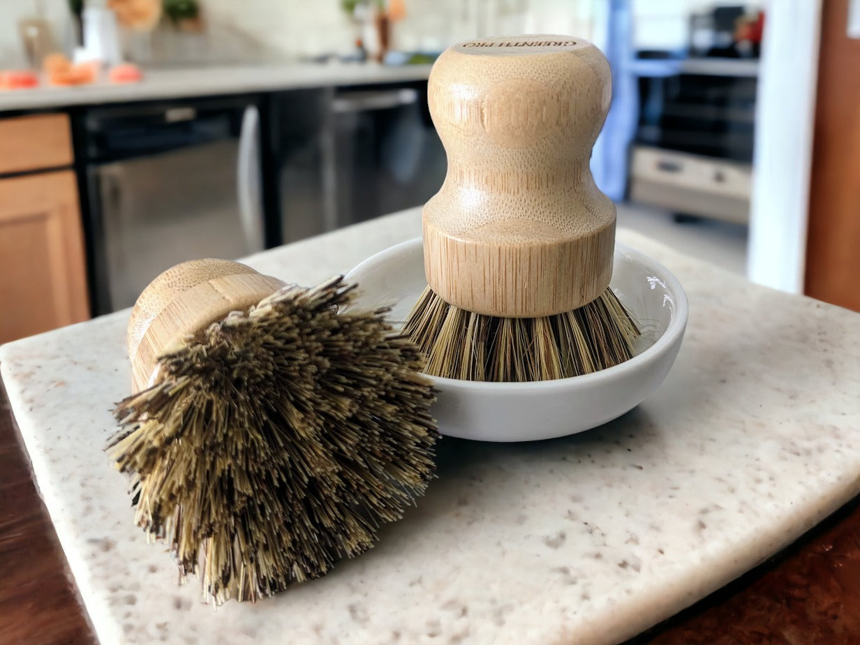 Eco-friendly bamboo dish scrubber with natural sisal bristles.  These green household scrubbers are Environmentally safe and biodegradable for those looking for eco-conscious cleaning supplies.