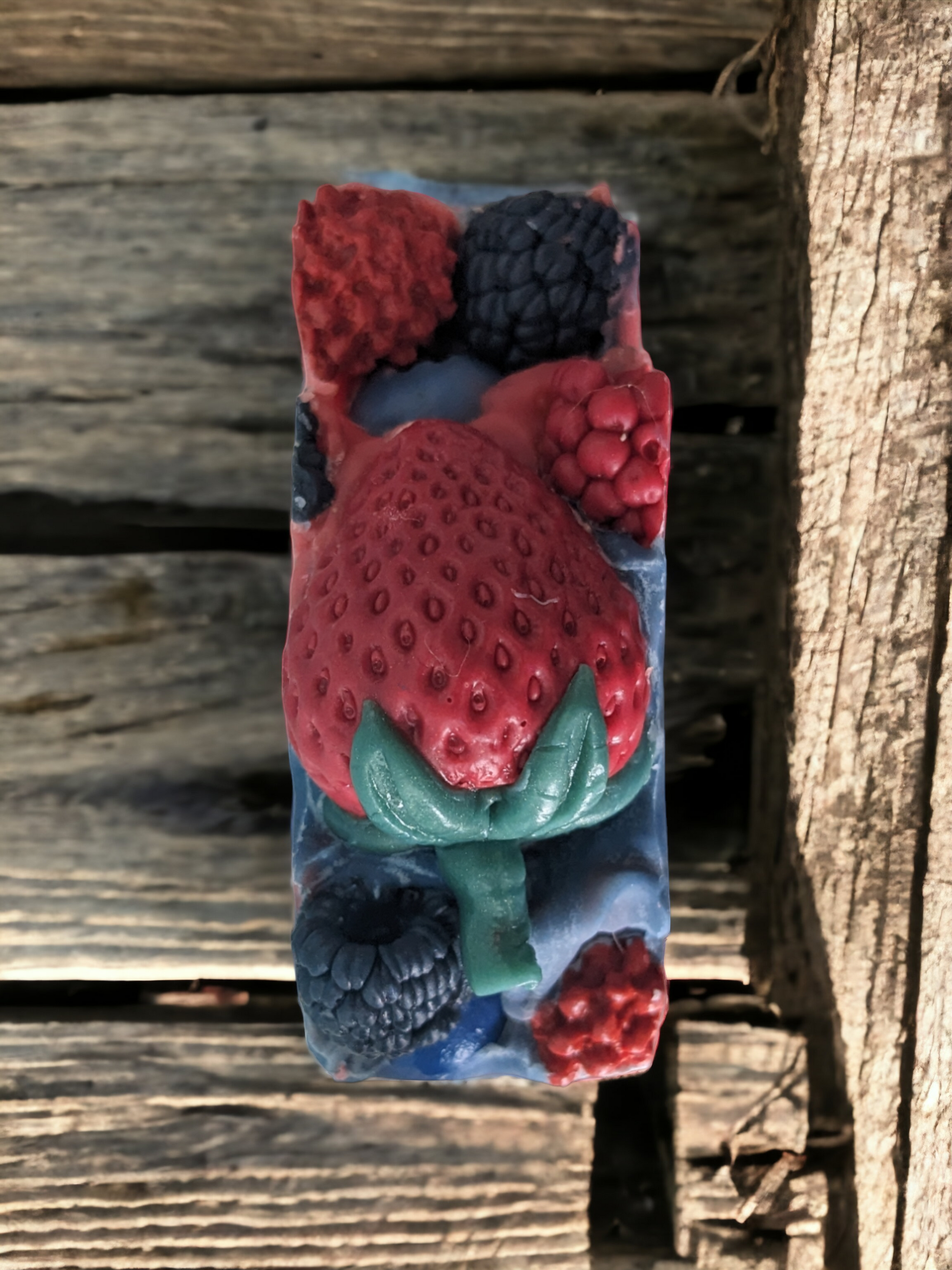 This quadruple butter artisan soap bar is a delight with it's Strawberry, Blueberry, Raspberry and Blackberry topped design. Loaded with skin loving ingredients, enjoy the luxurious blend of 'Berry Delightful' soap. Indulge yourself with the juicy scent mix of bergamot, blackberry, raspberry, peony, honeysuckle, and violet leaf. Notes of white woods, golden amber, and musk add complexity and depth.!