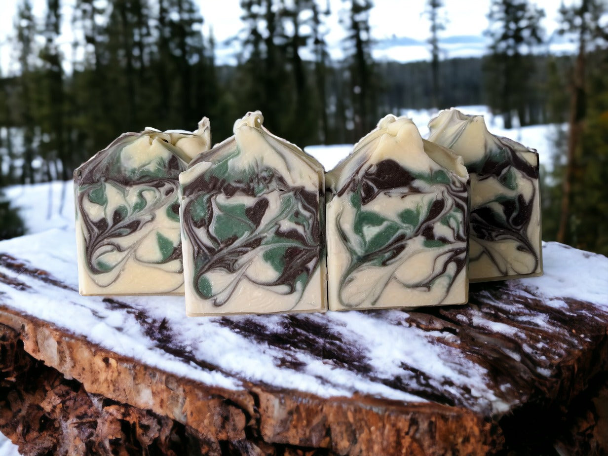 Unlock the magical power of the outdoors with our Forest Fresh - Camouflage luxury butter bar with Pine Scent! Take a walk through the crisp winter air with the soothing scent of evergreen trees and enjoy the mild exfoliation of the Kaolin clay for a unique, luxurious and refreshing experience. Treat yo' self!