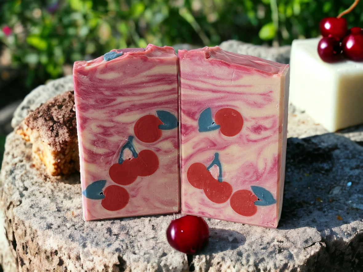 Delightful & creamy luxurious bar soap featuring cherry soap embeds and black cherry scent.  Creamy lather and lots of suds, this handcrafted soap bar is sure to please!