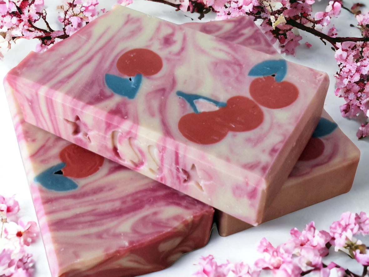 Delightful creamy bar soap featuring cherry soap embeds, light black cherry scent and natural soap nut surfactants .  Creamy lather and lots of suds, this small batch bar of soap is sure to please!