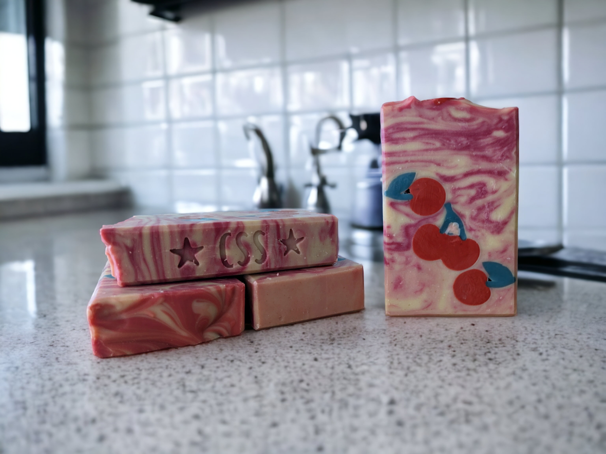 Fun and playful creamy bar soap featuring cherry soap embeds, light black cherry scent and natural soap nut surfactants . Creamy lather and lots of suds, this soap is sure to please!