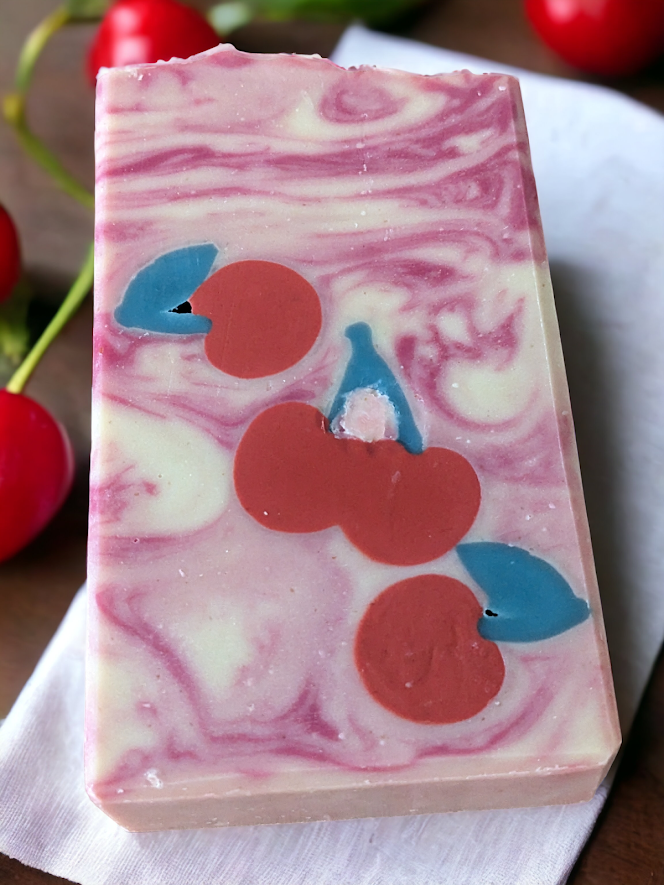 Delightful creamy bar soap featuring cherry soap embeds, light black cherry scent and natural soap nut surfactants . Creamy lather and lots of suds, this soap is sure to please!