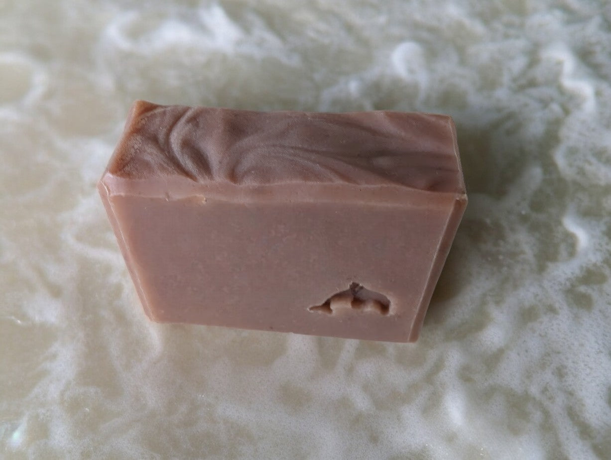 Single plum colored soap with a dolphin stamped into the front. Features goat milk, sea moss and the usual cast of Kaolin Clay, colloidal oats and soap nuts. It's a formidable bar with a fragrance to match its strength. It has a crazy bubbly lather too!! This Baccarat Rouge 540* to understand essence of the scent.