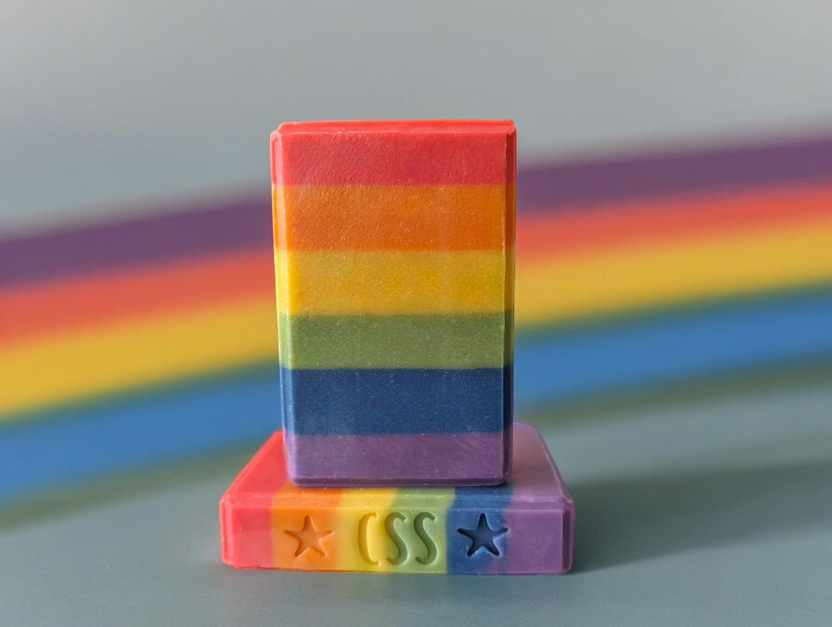 Bar Soap layer with rainbow / Pride flag colors.  To some, it's a vivid rainbow; to others, a bold and symbolic flag and playful, respectful homage to LGBTQ+ rights; Pride month, or a thoughtful present for anytime of the year. It's personal meaning varies, but the message remains: love is love. Scented with a fresh, clean that evokes the freshness of laundry sun-dried and breeze kissed on a warm summer day!