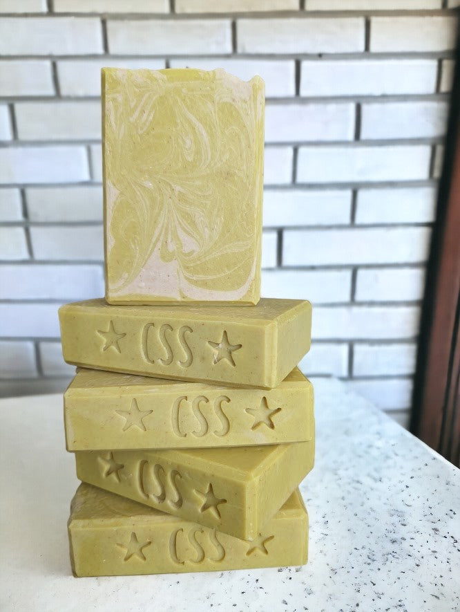 Cheryls Southern Soapery - Banana Breeze Bar Soap (aka Monkey Farts) Goat Milk Soap.  Mustard colored base with white swirls. Available in 3 sizes Regular bar, small bar and Travel Guest Hotel sized soap bar.