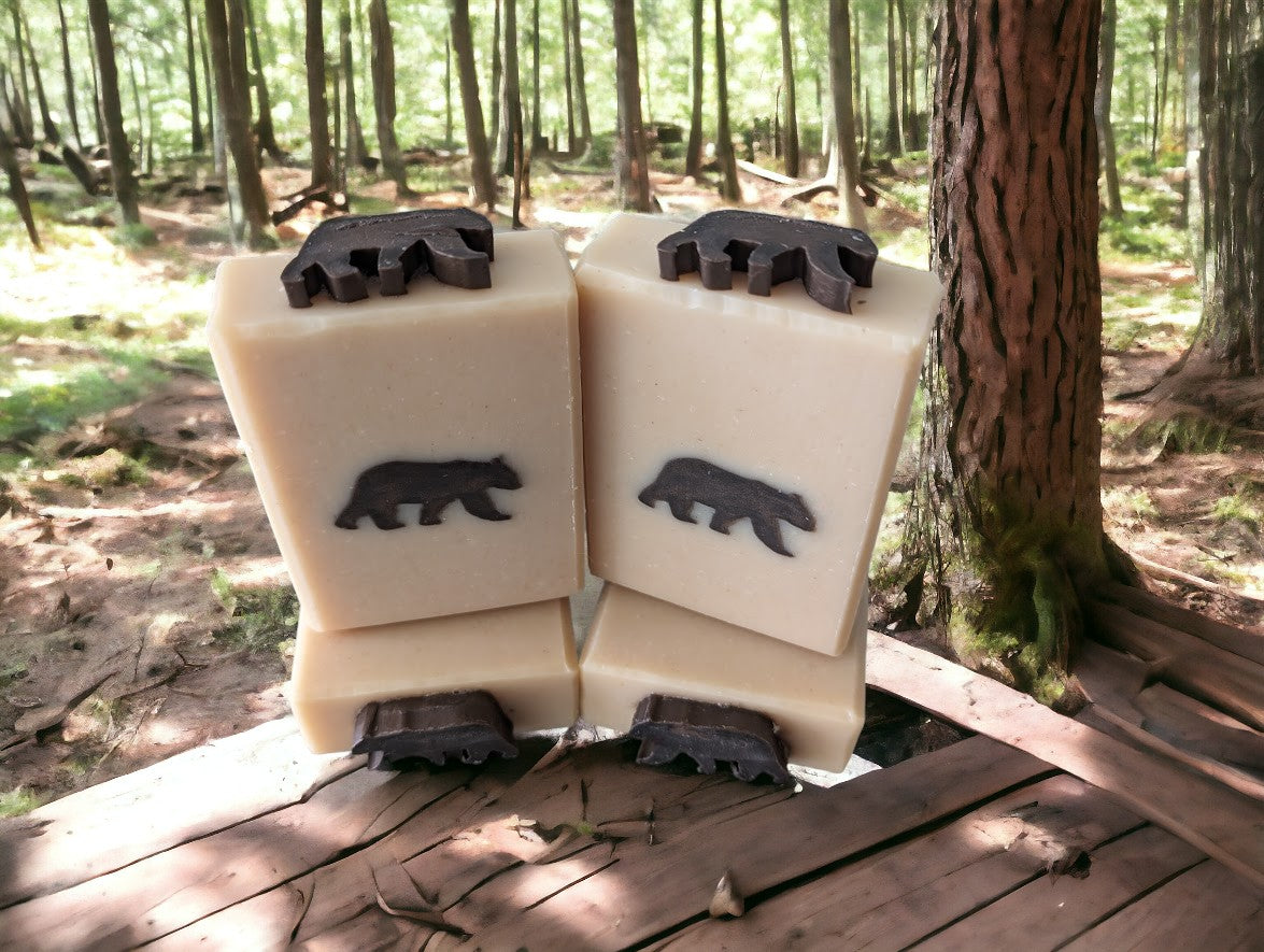 This artisan soap boasts a delightful dark brown bear-shaped embed on a light tan base. Perfect for Dad or the special man in your life, it's formulated with luxurious goat milk & tallow and is a treasure trove of nourishing ingredients such as Kaolin Clay & Colloidal Oats. Bump up your shower routine & lather up with this gentle bar. Your skin will feel 'bear-y' pampered.