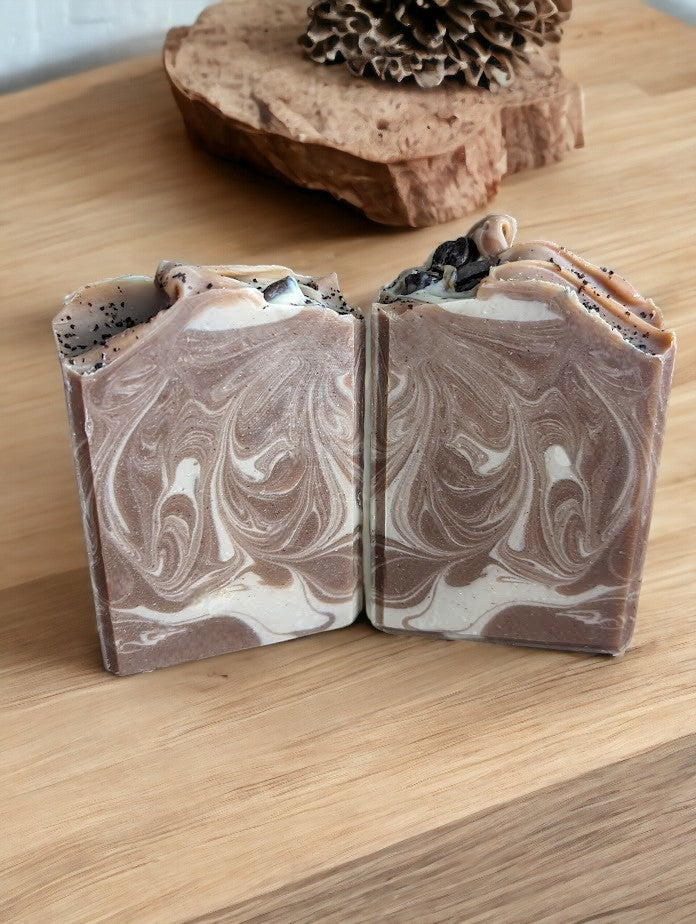 Cold process coffee soap bar with Kaolin Clay and Colloidal Oats.  Darker Brown with creamy colored swirls.  This Project Soapway Competition winner is loaded up with skin loving ingredients and is handcrafted with organic fresh brewed coffee & Espresso coffee fragrance oil. Up your health and beauty game with this good for your skin soap that delivers a crazy big & delightful lather. 