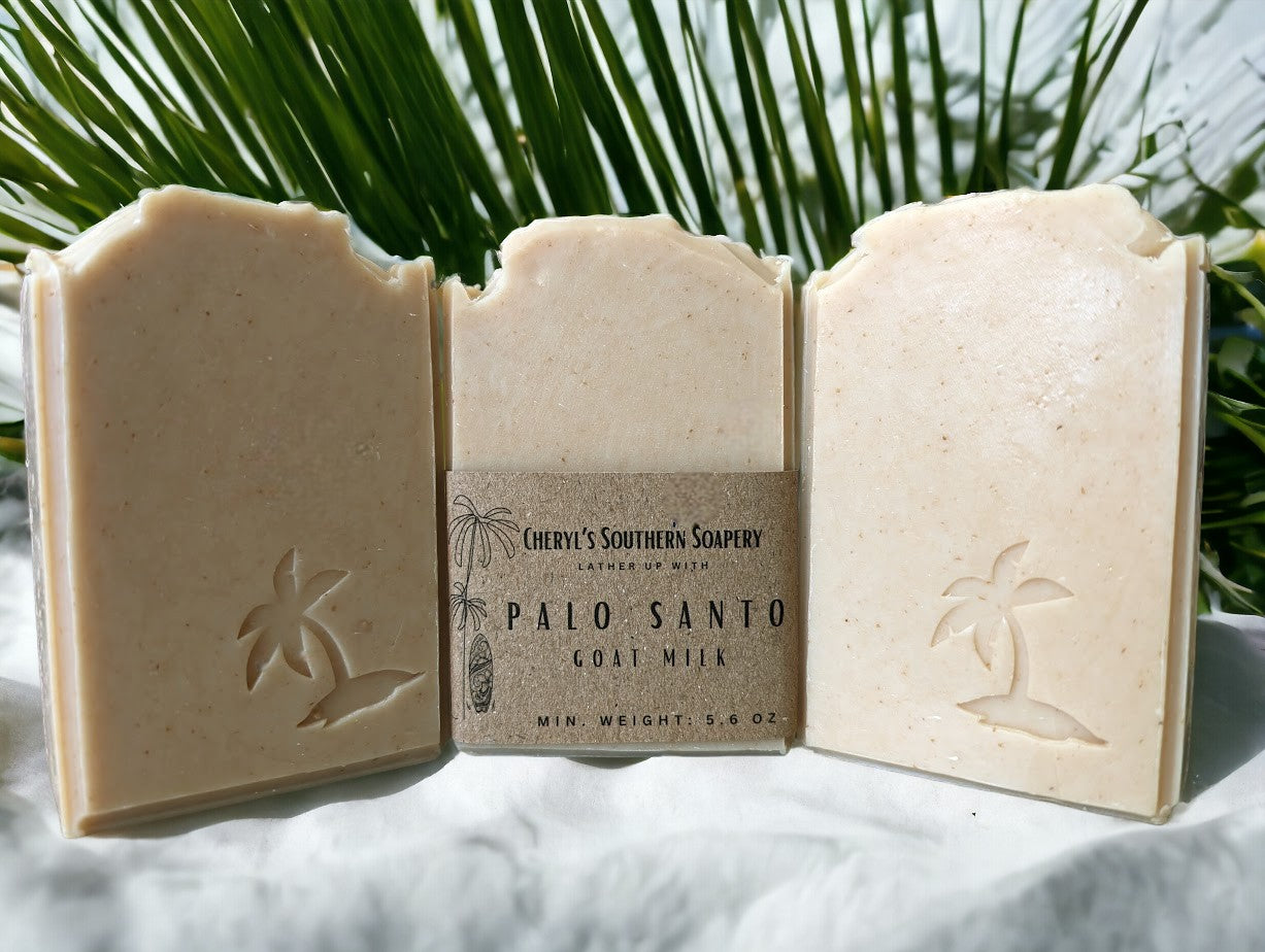 Smokey Beige colored, nourishing, artisan soap with Palm Tree, paw print, dolphin clown fish or sea horse embellishments. Features goat milk, kaolin clay, colloidal oats, & other nourishing ingredients, this skin loving soap is topped off with the divine Palo Santo fragrance oil. Comes in 3 sizes:  Regular bar, Small Bar and Travel / Guest size bar 