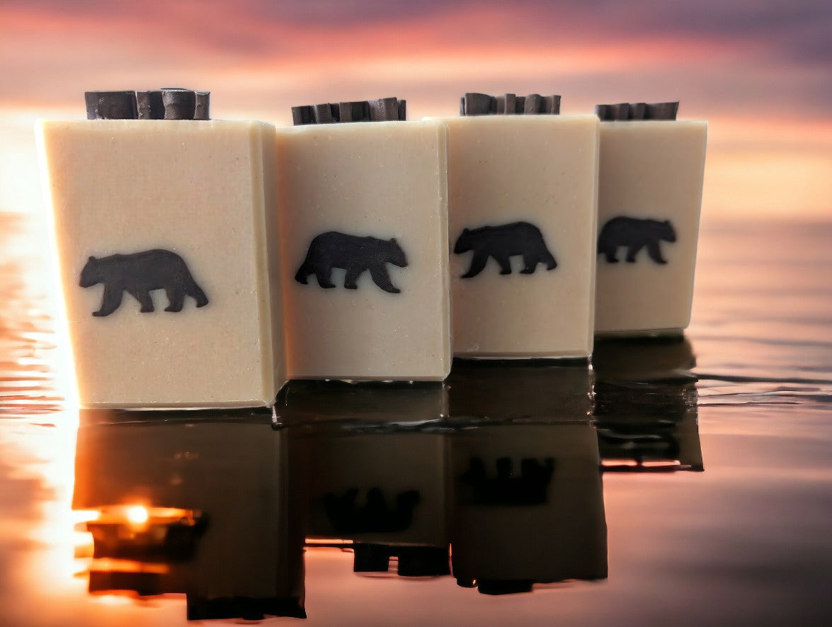 This artisan soap boasts a delightful dark brown bear-shaped embed on a light tan base. Formulated with luxurious goat milk & tallow, this soap is a treasure trove of nourishing ingredients such as Kaolin Clay & Colloidal Oats. Bump up your personal care routine & lather up with this gentle bar and your skin will feel 'bear-y' pampered.