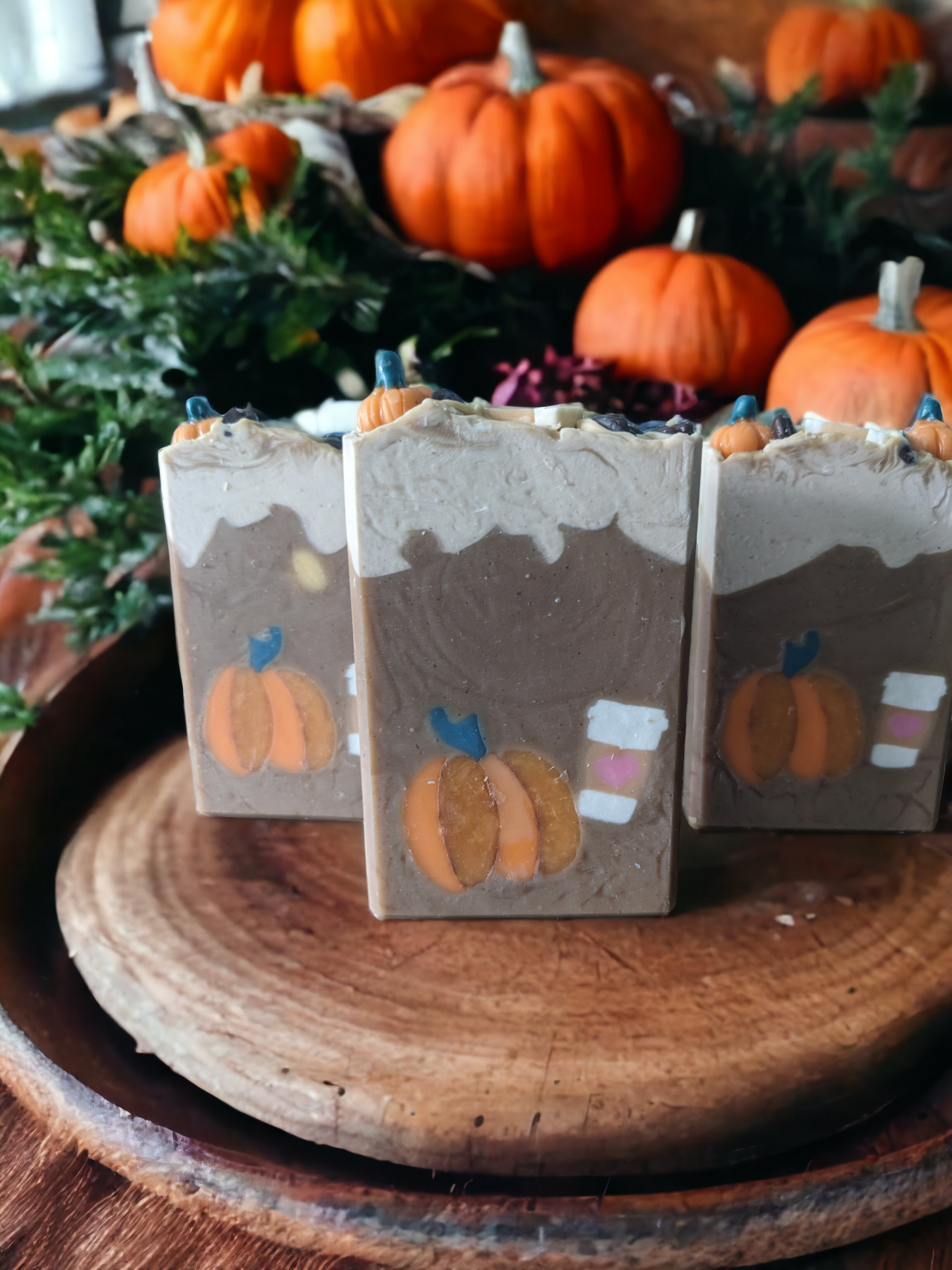 Luxury Artisan Bar soap - top decorated with delightful pumpkins, to go coffee cup and coffee beans with a creamy white top and latte brown interior with pumkpin and to go coffee cups that go through the width of the soap.