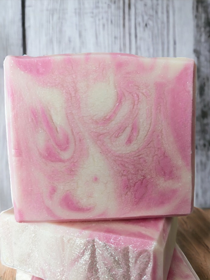 Pink and white swirly design unscented Rose Quartz bar soap! You'll discover a luscious lather made with Green Tea Seed Oil and Tussah Silk and skin loving oils. Dive into a delightful soapy oasis!