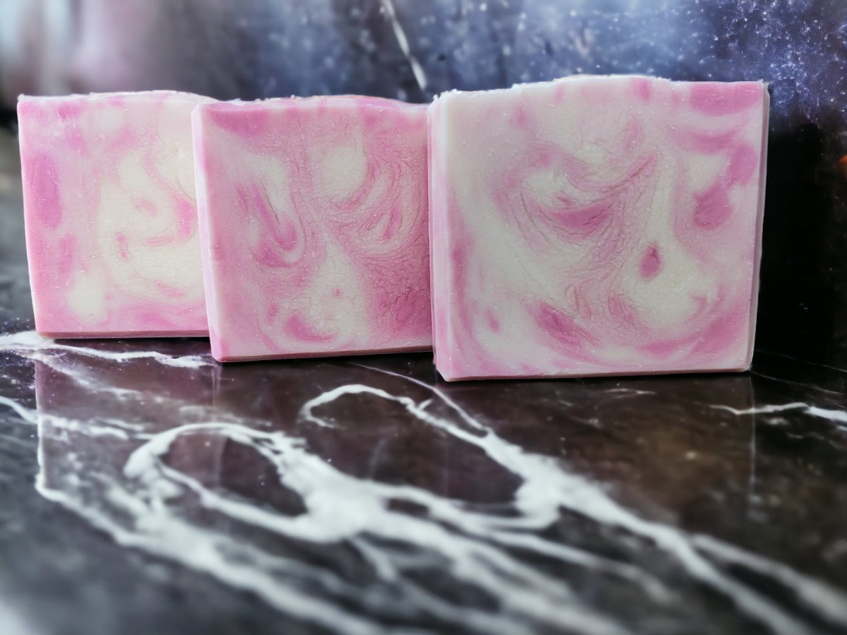 Hello!  You skin will love you for using this skin lovin' soap.  Dive into a delightful soapy oasis with this pink and white swirl design unscented bar soap! You'll discover a luscious lather made with Green Tea Seed Oil and Tussah Silk and other skin loving oils.