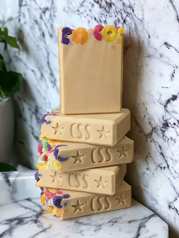 Decorative, fun and gentle on your skin, this creamy colored Tallow and Goat milk soap is topped with soap 'fruit loops'.  Think the iconic and colorful loop cereal for the scent.  It's spot on!  This decorative soap with up your skin care game with a splash of fun to shower or bath time!