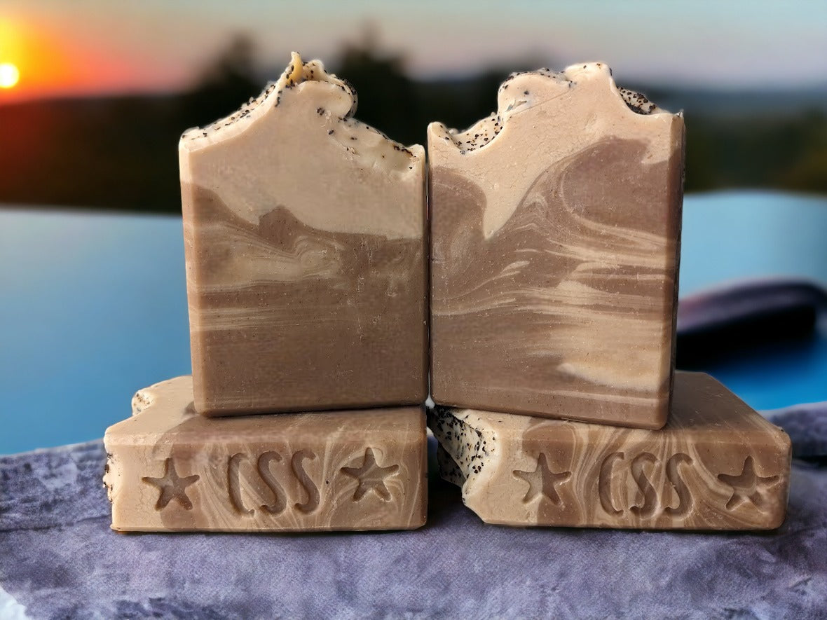 Handmade natural coffee soap. Brown and cream colored with French Vanilla Coffee scent. Crafted with fresh brewed organic coffee from Charleston Coffee Roasters. Plentiful, creamy lather.