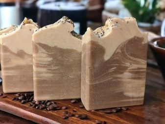 Natural coffee soap. Brown and cream colored swirls with French Vanilla Coffee scent. Crafted with fresh brewed organic coffee from Charleston Coffee Roasters. Plentiful, creamy lather.  This soap is divine and is the perfect gift for coffee lovers!