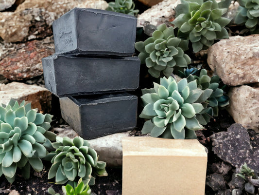 Facial soap bar Featuring Temanu Oil, tea tree oil and activated charcoal, the black color and unassuming look of this soap is deceiving—it's FANTASTIC for your face! Enjoy the deep cleanse and invigorating aroma every time you wash up! 