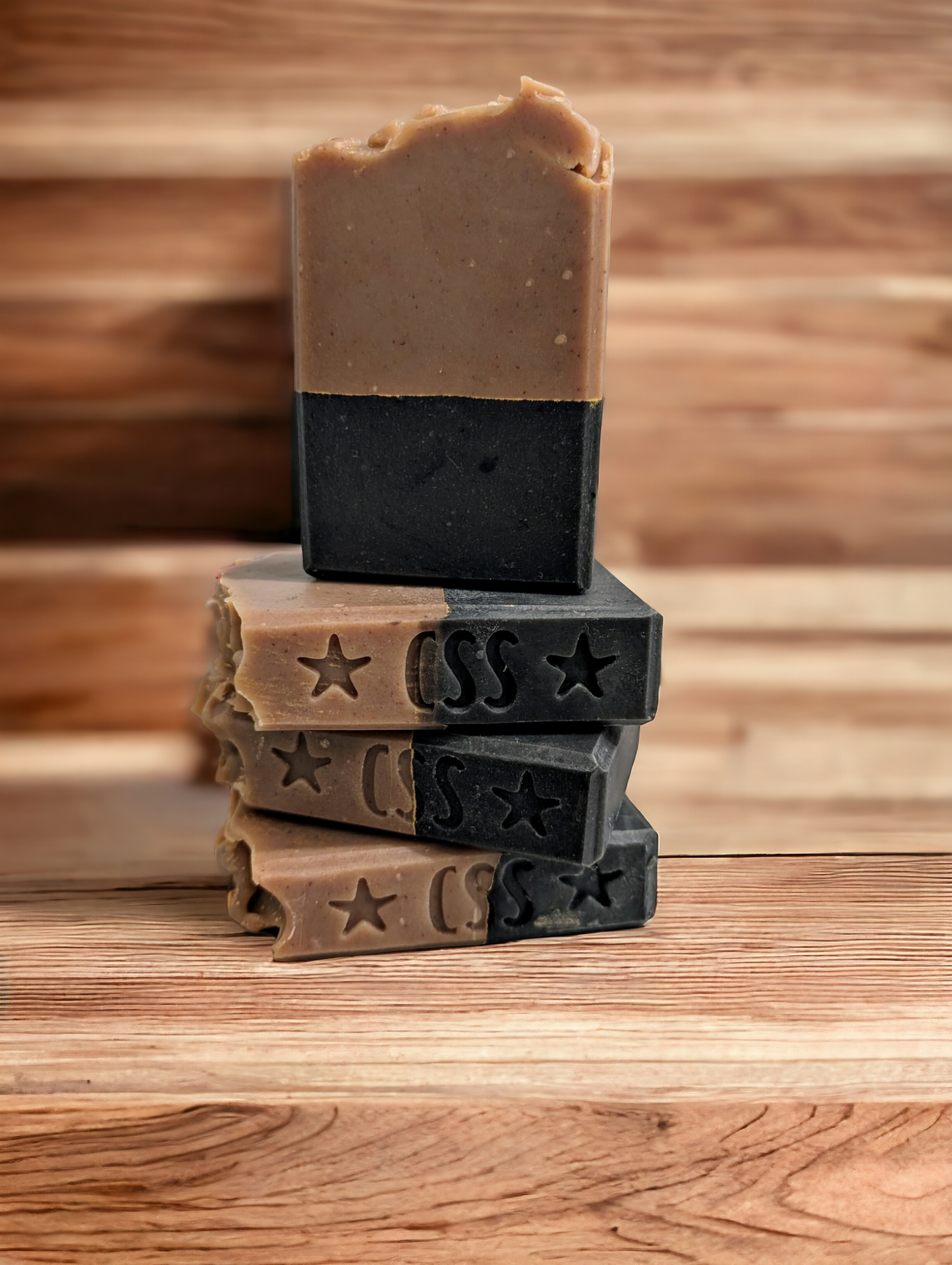 Goat Milk and Activated Charcoal layered soap for skin care.  2 layers separated by a line of gold mica.  Bottom layer is black and top layer is brown.    Manly scent is a blend of lavender, vanilla, woody, and musky tones create this fragrance. Think BBW/White Barn** or Commando** from Buff City and you'll understand.