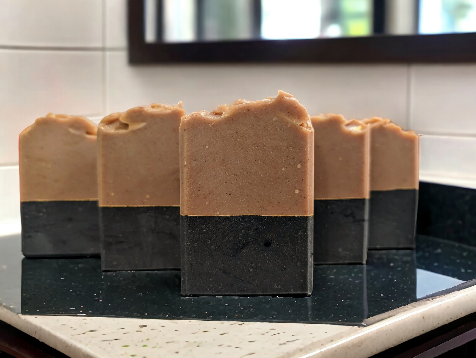 Available in travel/guest, small or regular size bars, you'll be able to boost your skin care routine at home or on the go with this Goat Milk and Activated Charcoal layered soap.  2 layers separated by a line of gold mica.  Bottom layer is black and top layer is brown.    Manly scent is a blend of lavender, vanilla, woody, and musky tones create this fragrance. Think BBW/White Barn** or Commando** from Buff City and you'll understand.