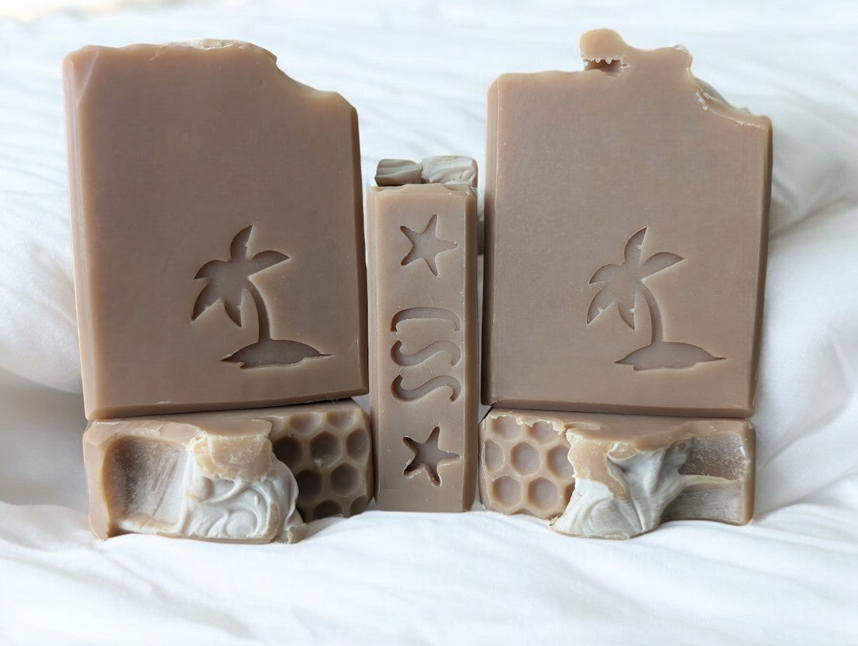 Ease your way into the day with our Oatmeal, Milk and Honey Soap! This luxurious 4 butter bar and goat milk soap is sure to leave your skin feeling soft and refreshed. With a light fragrance of oatmeal, milk, and honey it will awaken your senses. This is a wonderful addition to your personal care line-up!