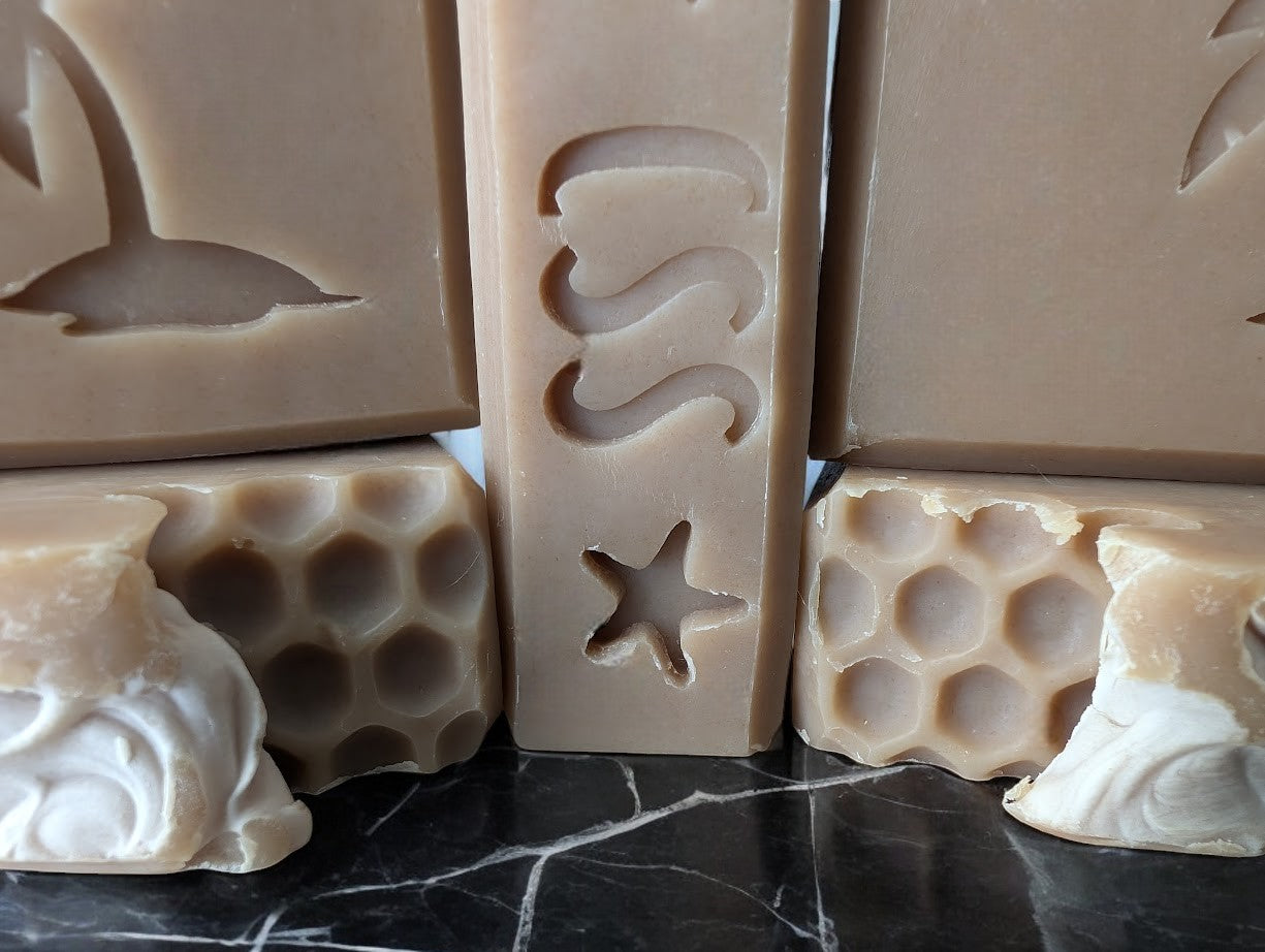  Simple, natural soap with shea, cocoa, mango, and kokum butters. Creamy, sudsy lather with a light oatmeal, milk, and honey fragrance. Leaves skin soft and refreshed. Perfect for your shower or bath!