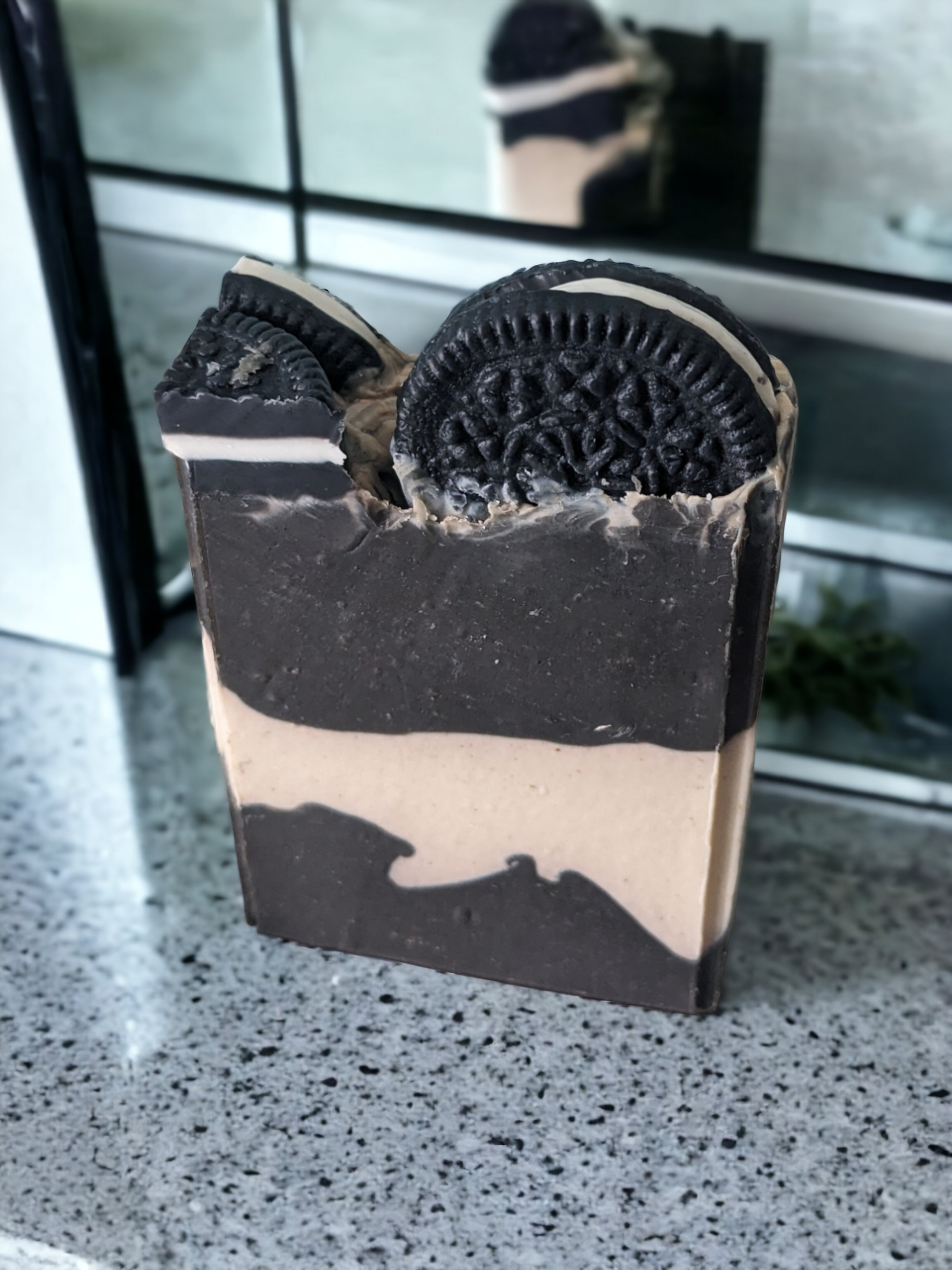 Our delightful Cookies & Cream! quadruple butter bar soap will have you feelin' like a kid again! The top of this decorrative soap bar is decorated with 'oreo like' cookies and cookie pieces. The body has layers of black and white. With it's delicious vanilla scent, Activated Charcoal and the added luxury of silk, goat milk, mango, shea & cocoa butter, It' time for a cookie par-tay!