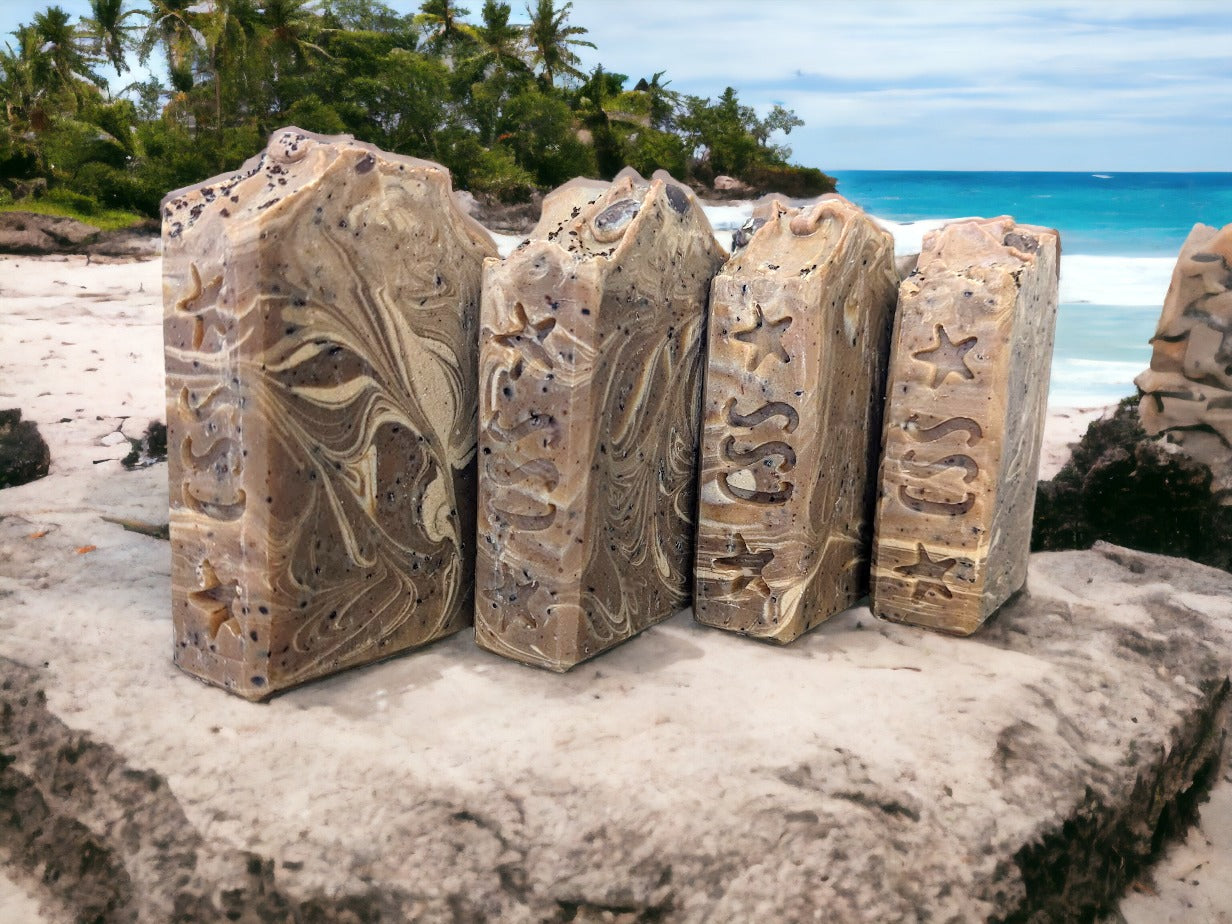 Experience the ultimate with this all-natural and handcrafted coffee soap! The perfect gift for coffee lovers! Natural brown with delicate and creamy swirls, with a pinch of coffee grinds on top and throughout for a gentle exfoliation.  This soap bar will tantalize your senses with its delightful hazelnut coffee scent & rich, bubbly lather. It's brimming with skin loving ingredients that'll give your skin a treat.