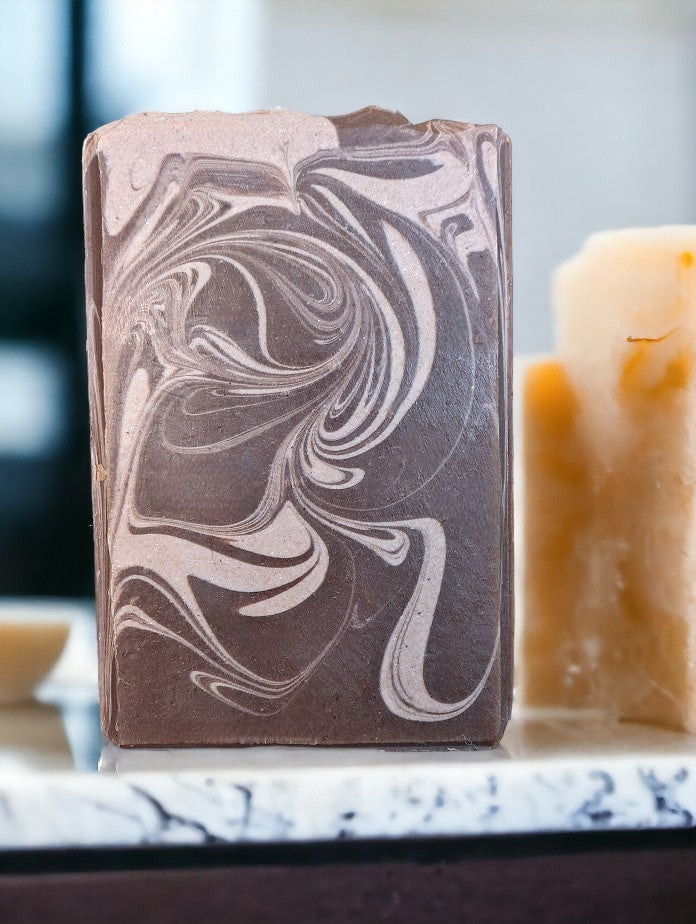 Hemp Oil and Goat Milk soap bar dark brown base with light brown swirls.  This soap bar is exceptional, not just because of its good for your skin base, but it will tantalize your olfactory senses with its much-loved Cocoa Butter Cashmere fragrance! Available in 3 sizes.  It's a wonderful addition to your bath and beauty routine!