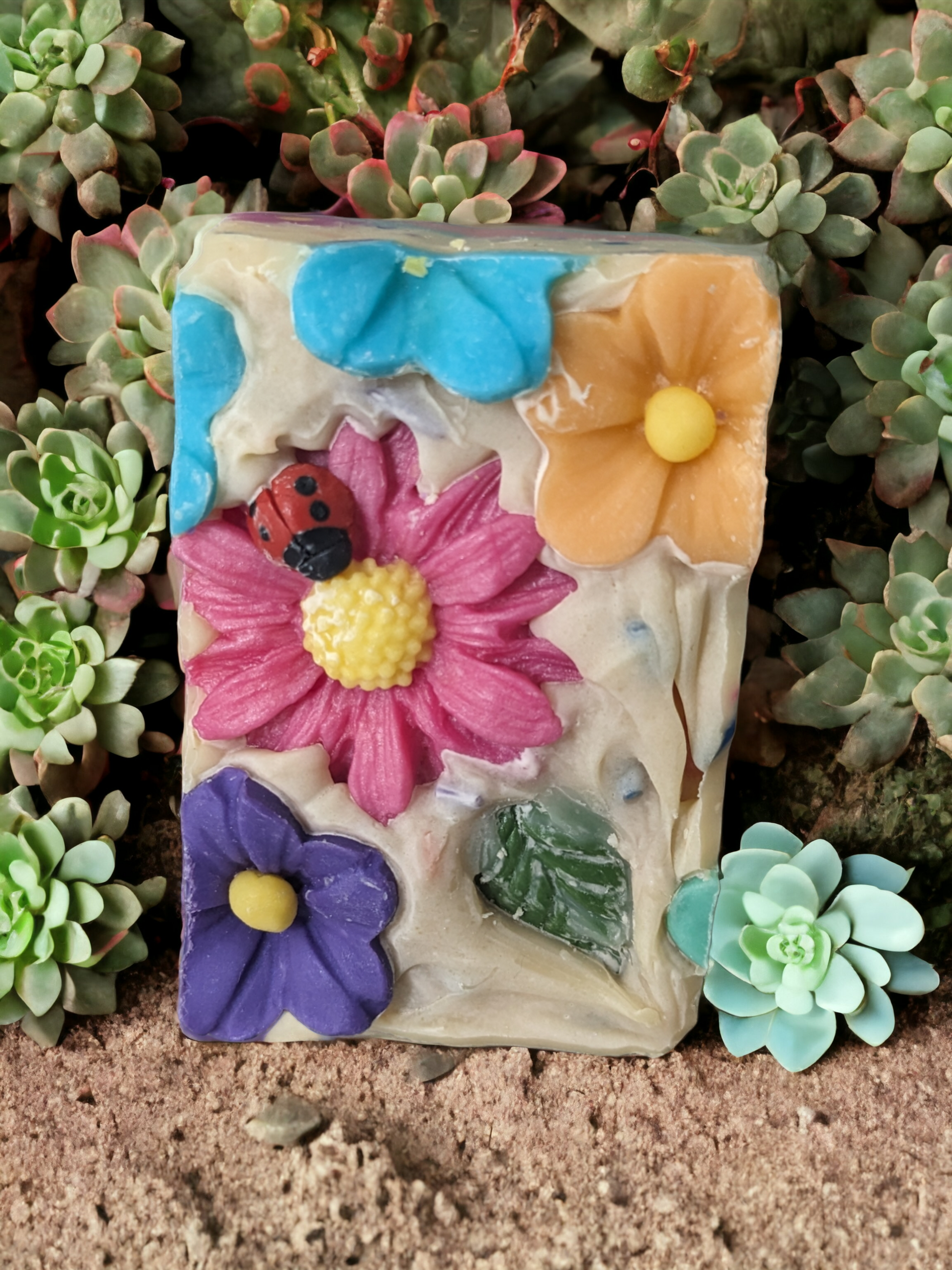 Take a cheery escape with our Floral Fiesta soap! Loaded with skin loving ingredients, this delightful soap is topped with florals, has multi-colored soap sprinkes throughout and flowers that go side to side.  The scent is off the charts with a Coco Mademoiselle like fragrance oil.  So tantalize your senses with scent filled bubble and a kaleidoscope bar of blooms that'll have you feelin' as revitalized as a siesta, so you can rock your Fiesta all day long.