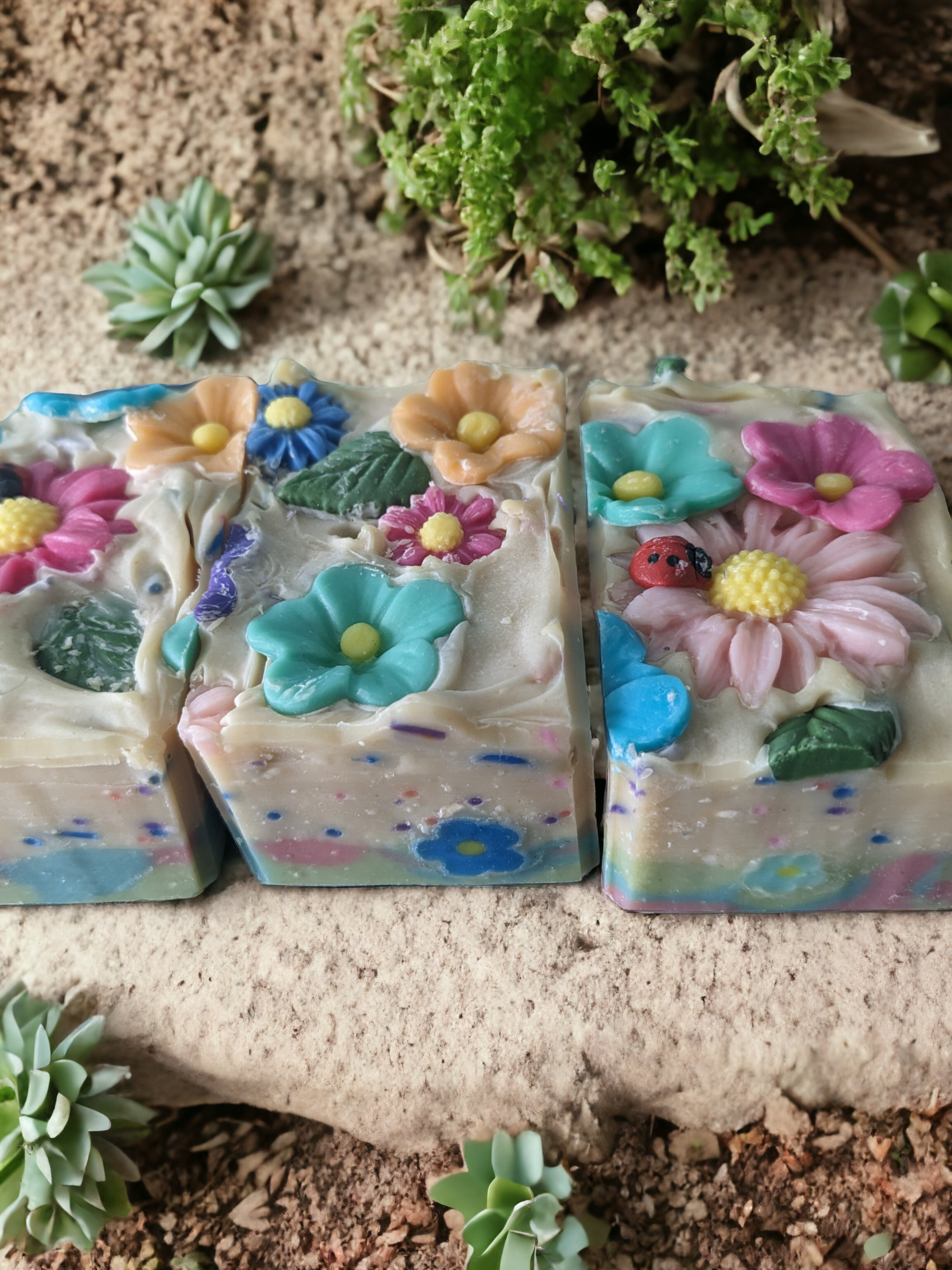 Take a cheery escape with our Floral Fiesta soap! Loaded with skin loving ingredients, this delightful soap is topped with florals, has multi-colored soap sprinkes throughout and flowers that go side to side.  The scent is off the charts with a Coco Mademoiselle like fragrance oil.  So tantalize your senses with scent filled bubble and a kaleidoscope bar of blooms that'll have you feelin' as revitalized as a siesta, so you can rock your Fiesta all day long