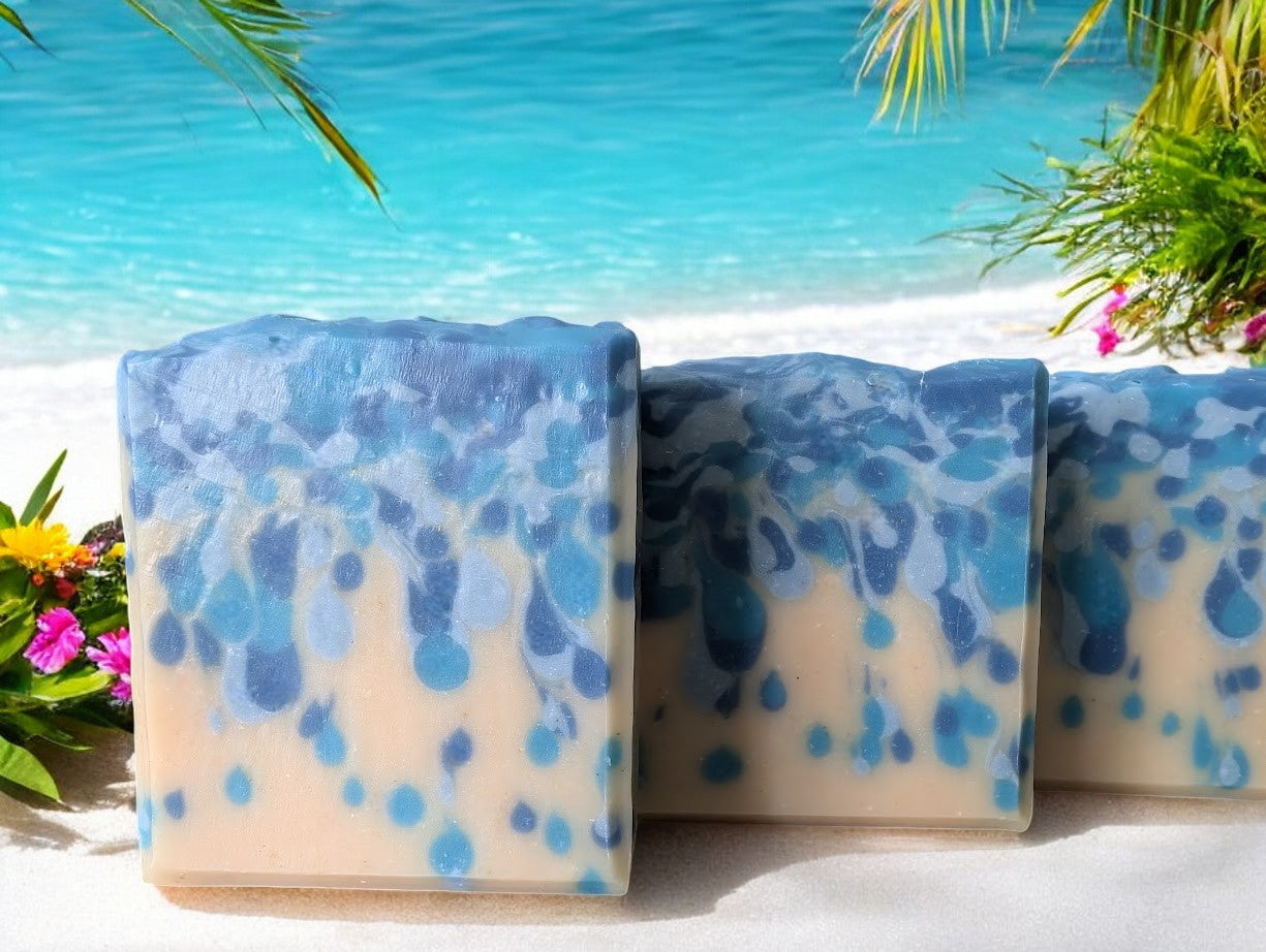 Bubbly goat milk soap scented with Black Raspberry Vanilla. Handcrafted with blue drop swirls on a cream base, evoking ocean water or sea pearls. Enriched with Goat Milk, Kaolin Clay, and Colloidal Oats for a rich, bubbly lather. Perfect addition to your body and body products.