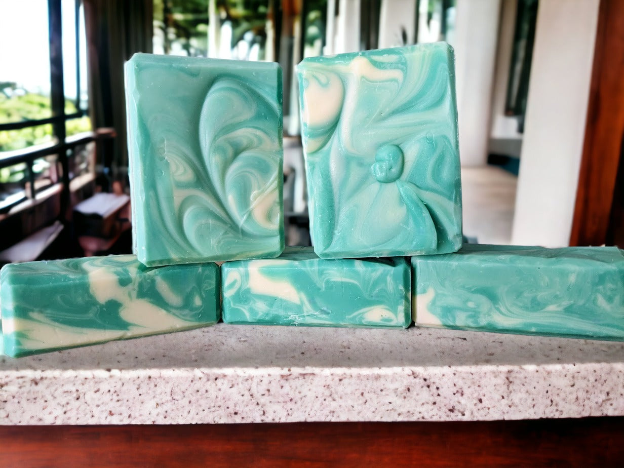 Lovely handmade soap with swirls in various shades of green and white.  Scent is reminiscent of the famous soap scent of a similar name.  This is a great everyday soap! 