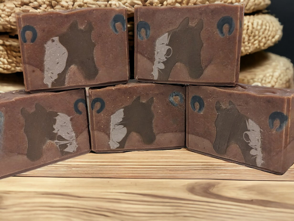 Soap featuring Horse head silhouette against a two tone brown background. This unique soap is the perfect gift for a horse lover.  Lovingly crafted with top-notch ingredients like goat milk and colloidal oats.